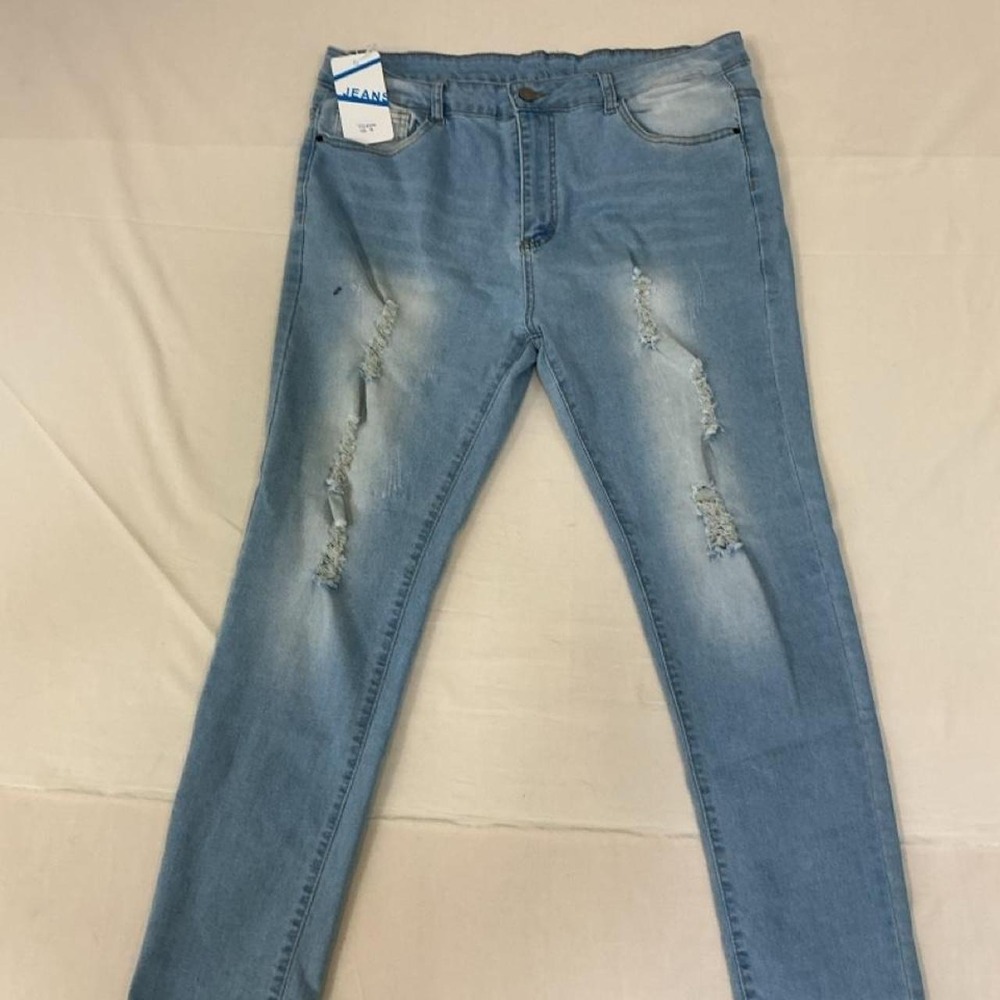 Light wash distressed jeans‎